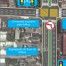 Um mapa de uma cidade com um semáforo e uma placa de rua ao seu lado e um semáforo do outro lado da rua (uma renderização digital: 0,327).
